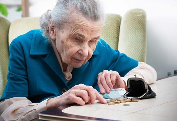 Senior woman counting money