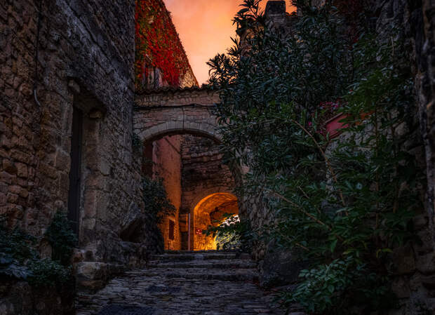 Sunset through Arch by Jerry Nichols on 500px.com