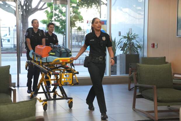 TNT assist a victim at the scene of a call.
