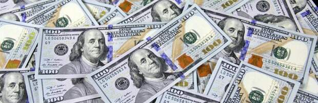 Курс доллара немного вырос на торгах