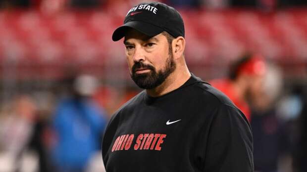 Ryan Day walks the field before an Ohio State game.