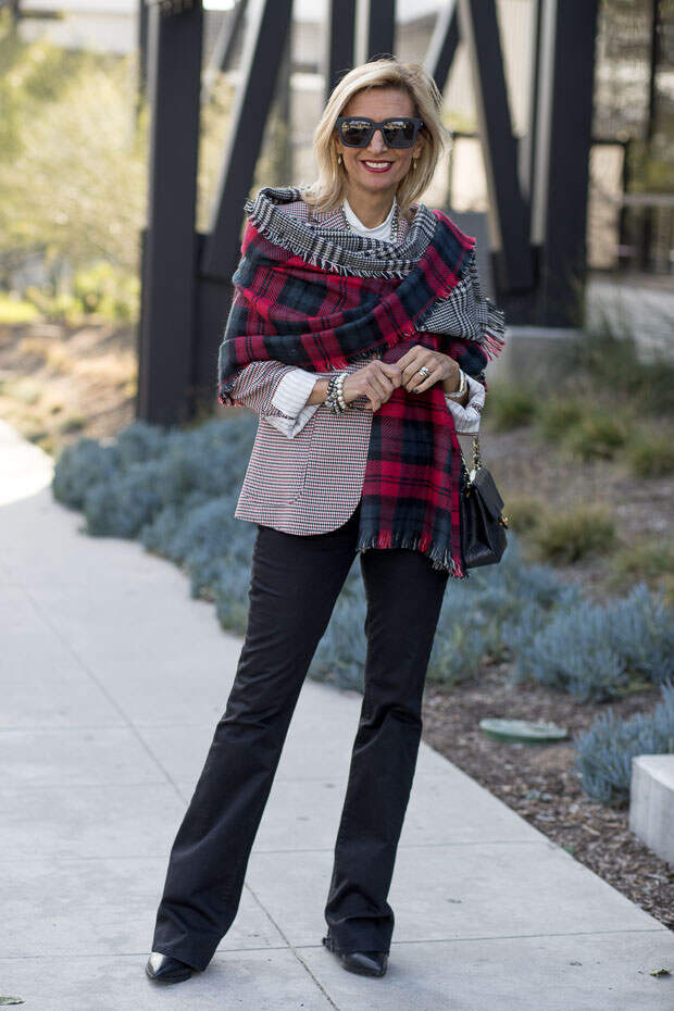 red ivory and black houndstooth blazer for women worn with reversible red black and gray plaid shawl 