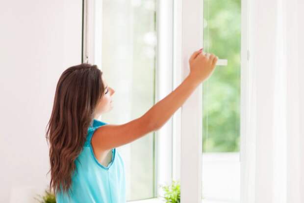 beautiful-woman-breathing-freshness-air Уход за пластиковыми окнами: полезные советы