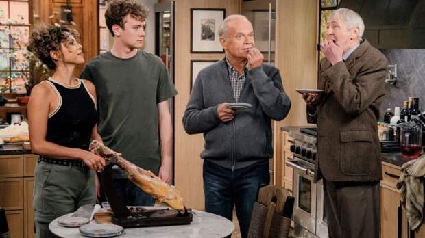 Eve, David, Frasier and Alan eat ham in the kitchen