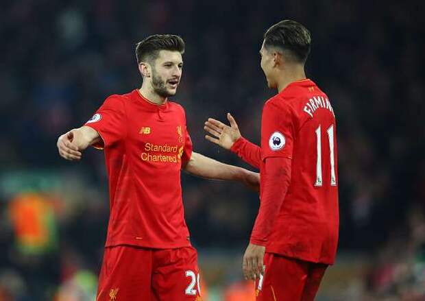 Картинки по запросу Adam Lallana of Liverpool celebrates with Roberto Firmino after the Premier League match between Liverpool and Tottenham Hotspur at Anfield on February 11, 2017 in Liverpool, England.