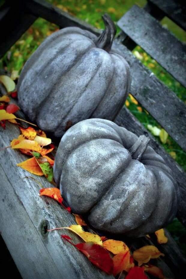 Concrete Garden Pumpkins!  Make a mold....use Leak Stop