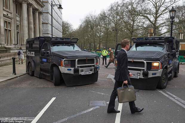 Armoured vehicles guarded roads around Parliament Square in a show of force in the wake of Wednesday's terror attack
