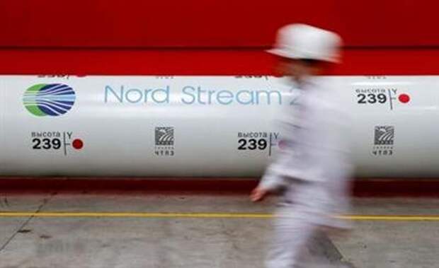 FILE PHOTO: The logo of the Nord Stream 2 gas pipeline project is seen on a pipe at the Chelyabinsk pipe rolling plant in Chelyabinsk, Russia, February 26, 2020. REUTERS/Maxim Shemetov/File Photo/File Photo