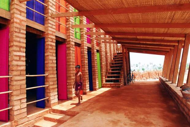 colors-pop-at-the-sra-pou-vocational-school-in-cambodia-villagers-can-visit-the-brick-building-to-learn-arithmetic-or-how-to-start-a-small-business
