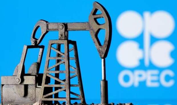 A 3D printed oil pump jack is seen in front of displayed Opec logo in this illustration picture, April 14, 2020. REUTERS/Dado Ruvic/Illustration