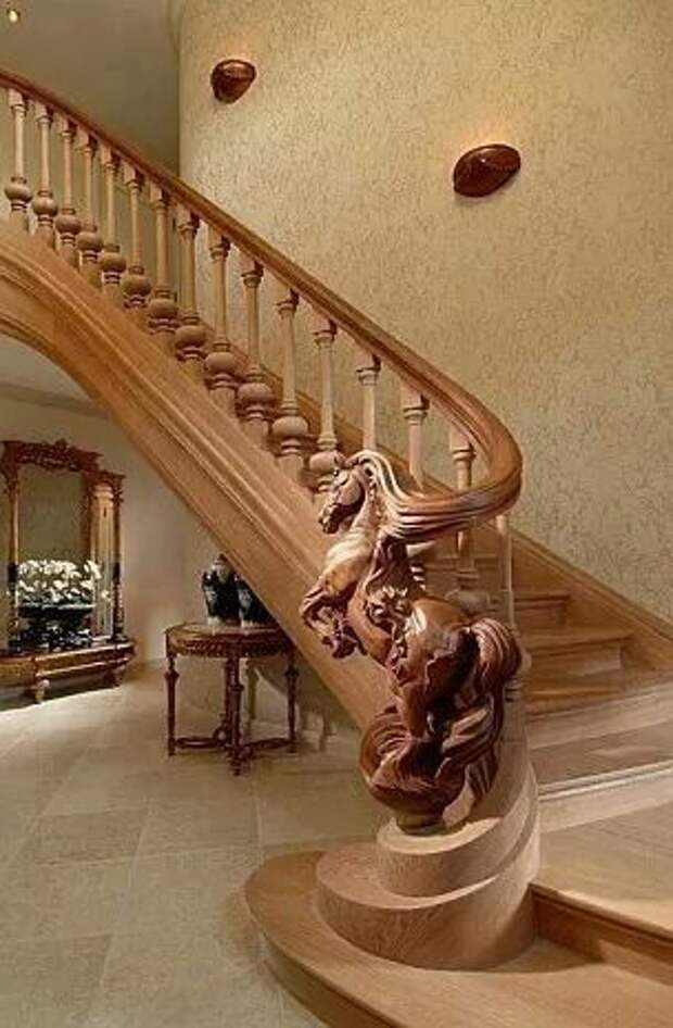 Just imagine sliding down this banister and onto a horse. I'm on a horse. - Custom carved wooden stairs
