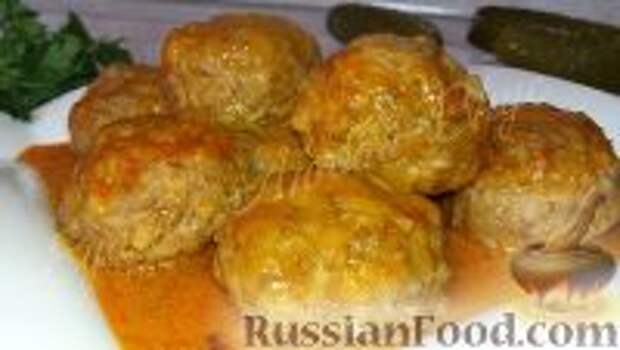 Фото к рецепту: Домашние тефтели с рисом (в духовке)