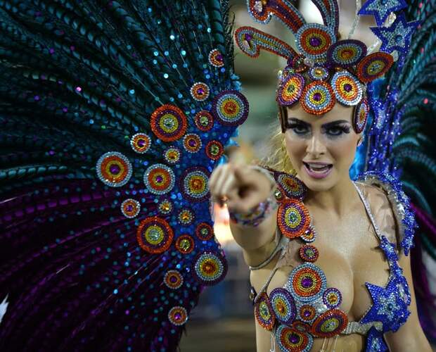 A dancer from the Grande Rio samba school performs during the first night of Carnival, on March 2, 2014.