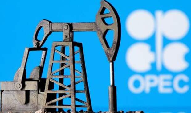 A 3D printed oil pump jack is seen in front of displayed Opec logo in this illustration picture, April 14, 2020. REUTERS/Dado Ruvic/Illustration