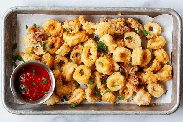 Кольца кальмаров в кляре. \ Фото: pinterest.com. Кольца кальмаров в кляре. \ Фото: pinterest.com.