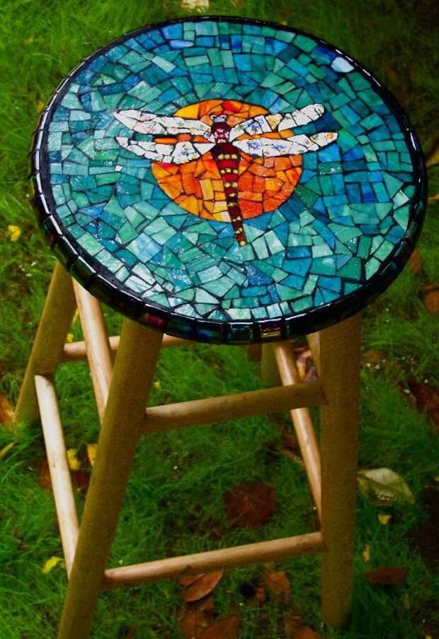 Dragonfly mosaic stool.  But I think this would look better as a small round table top.