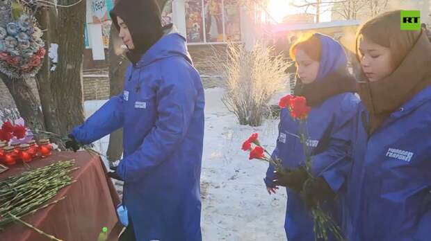 Жители ДНР и активисты почтили память жертв обстрела донецкого рынка