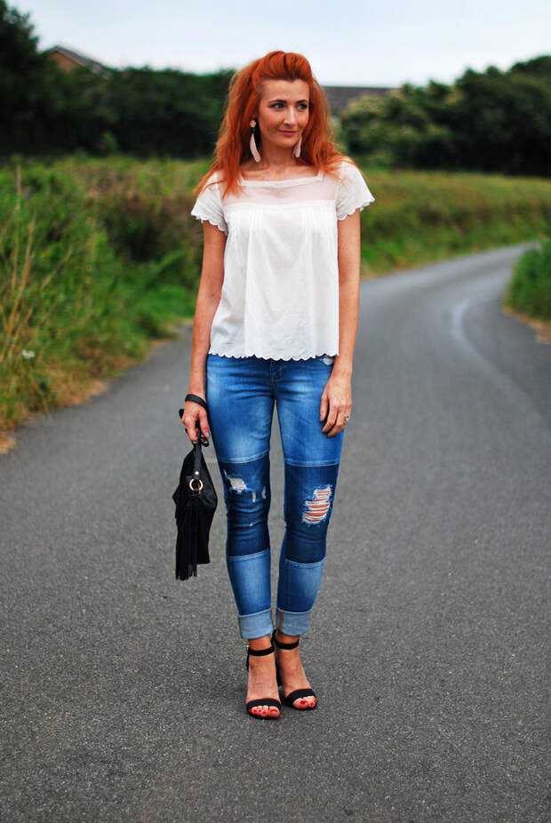 White summer top and distressed patchwork jeans