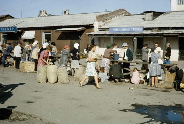 Russia, people gathered at street market. Siberia Russia, people gathered at street market. Siberia