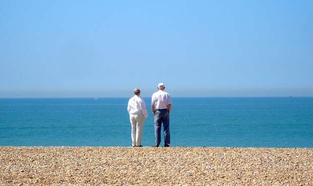 Elderly couple on the beach Elderly couple on the beach