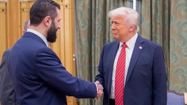 Трамп и Ал-Джулани (скрин с видео телеканала Al Jazeera). Трамп и Ал-Джулани (скрин с видео телеканала Al Jazeera).