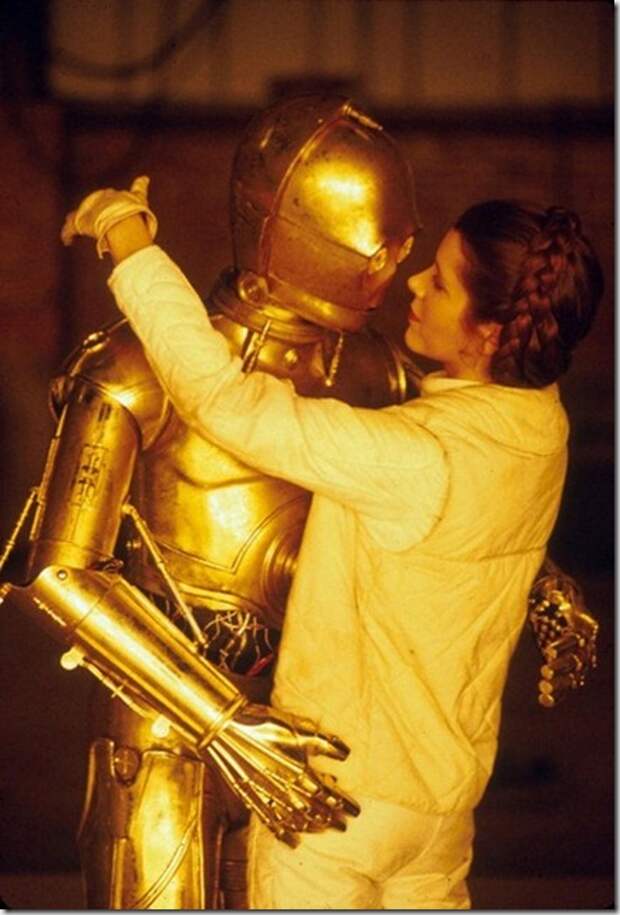 Jun 01, 1980; Los Angeles, CA, USA; Europe, South Africa, Japan, Australia, New Zealand OUT! Actor ANTHONY DANIELS stars as 'C-3PO' and Actress CARRIE FISHER stars as 'Princess Leia' on the set of Star Wars Episode V 'The Empire Strikes Back'.<br />Mandatory Credit: Photo by Lynn Goldsmith/ZUMA Press.<br />(©) Copyright 1980 by Lynn Goldsmith