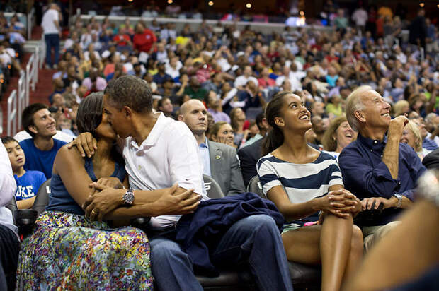 President Barack Obama Kisses First Lady Michelle Obama For The