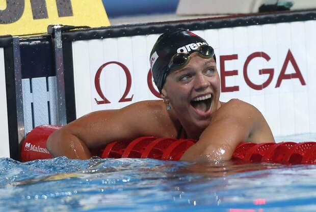 Yuliya Efimova of Russia reacts after she set a world record in the women's 50m breaststroke heats during the World Swimming Championships at the Sant Jordi arena in Barcelona August 3, 2013 (REUTERS)