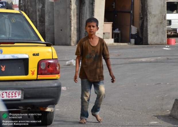 ребенок на улице в Дамаске