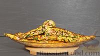 Фото к рецепту: Кабачковые "чебуреки" с мясом, зеленью и сыром