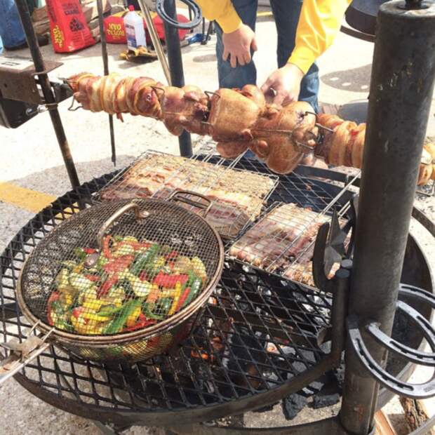 Bacon-wrapped squirrel, grilling at the 2014 World Champion Squirrel Cookoff.