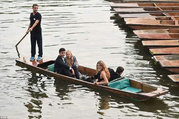 Four revellers are treated to a ride in a punt boat following the evening's decadent festivities in Cambridge
