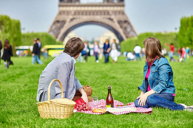 Having A Picnic Near The Eiffel Tower In Paris, France