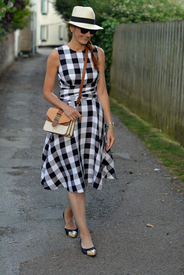 Not Dressed As Lamb | Fit-and-flare black and white gingham dress, Panama hat, pointed flats