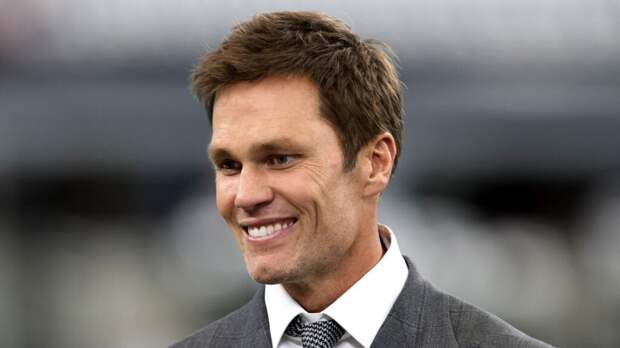 Tom Brady, former NFL quarterback, looks on before the Detroit Lions play the Dallas Cowboys at AT&T Stadium on October 13, 2024 in Arlington, Texas.