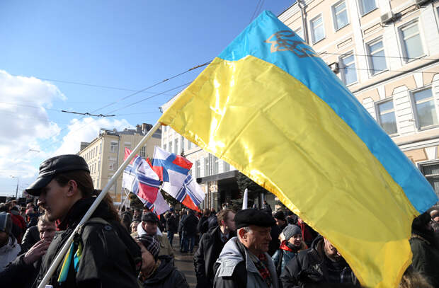Во время марша памяти, посвященного годовщине гибели политика и общественного деятеля Бориса Немцова. Фото: Андрей Епихин / ТАСС