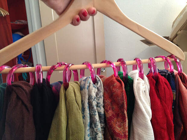 Use shower hooks on a hanger to store all of your scarves.