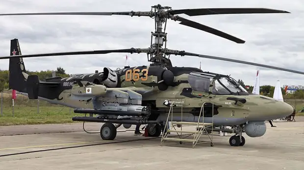 Минобороны России показало удары вертолетов Ка-52 по ангарам ВСУ с оружием