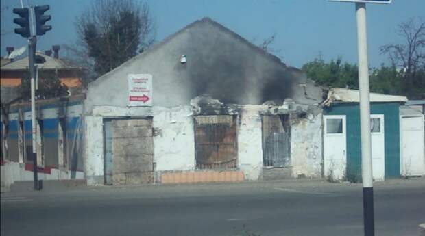 Burned_down_builing_in_Osh,_2011