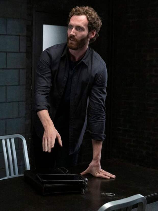 A suspect and his lawyer in the interrogation room on Law & Order: SVU Season 26 Episode 12