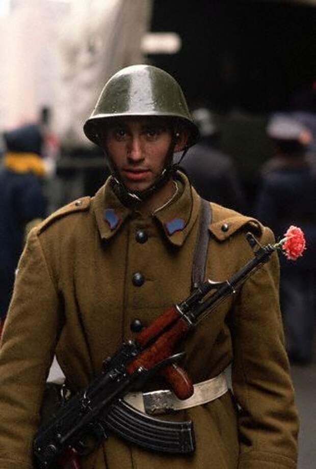 Romanian Soldier with Flower in Rifle Romanian Soldier with Flower in Rifle