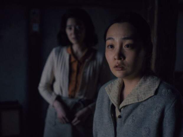 Sunja wears a blue sweater