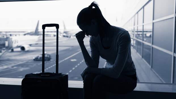 sad wife at the airport