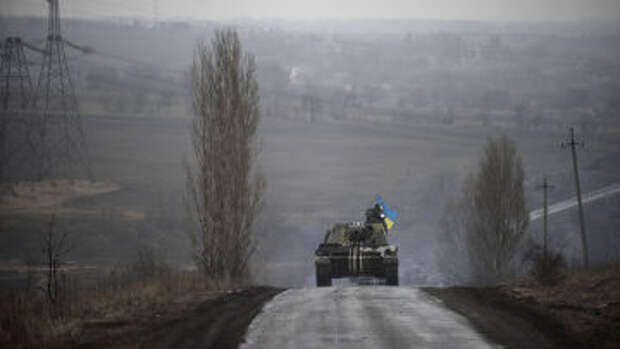 Танк украинской армии на окраине Донецка, 4 марта 2015 года Танк украинской армии на окраине Донецка, 4 марта 2015 года
