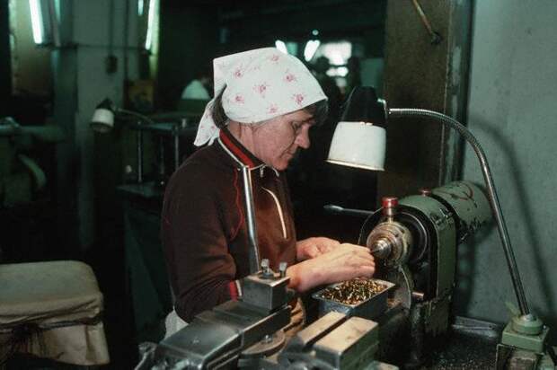 Woman Working in Electronics Factory