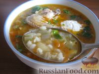 Фото к рецепту: Рассольник из курицы с перловкой