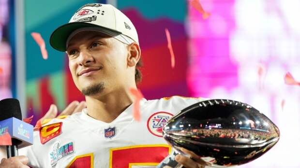 Patrick Mahomes holding the Lombardi Trophy