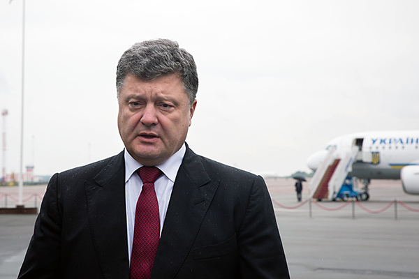 Петр Порошенко во время заявления в аэропорту Киева, 28 августа 2014 года. Фото: Михаил Палинчак / ИТАР-ТАСС