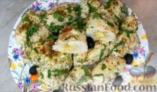 Фото к рецепту: Куриные рулетики с ананасом и сыром