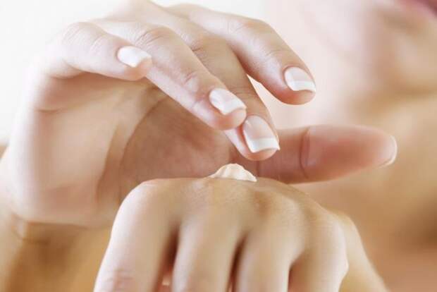 applying hand lotion
